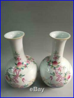 A Pair Of Chinese Famille Rose Porcelain Crane & Peach Vase with Qianlong Marks