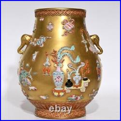 Chinese Qianlong gold relief famille rose pattern elephant trunk porcelain vase