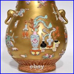 Chinese Qianlong gold relief famille rose pattern elephant trunk porcelain vase